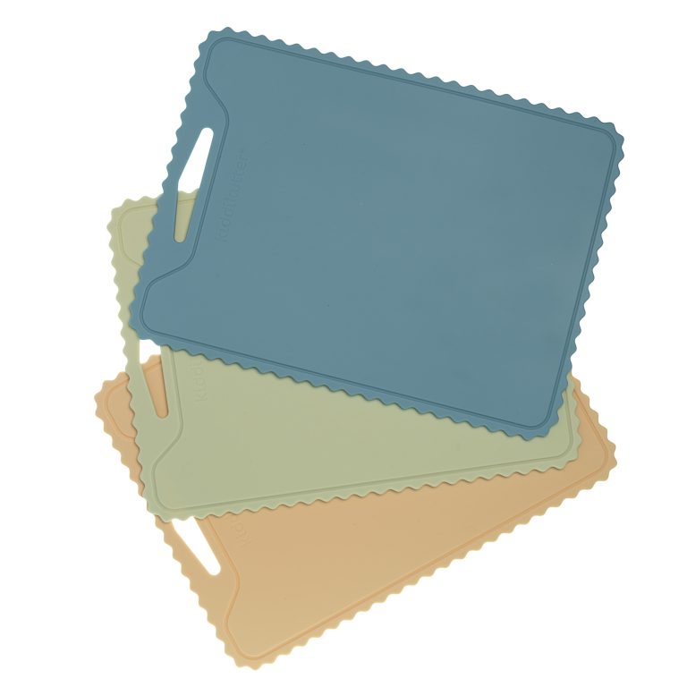 Silicone cutting boards in blue, sage and cream